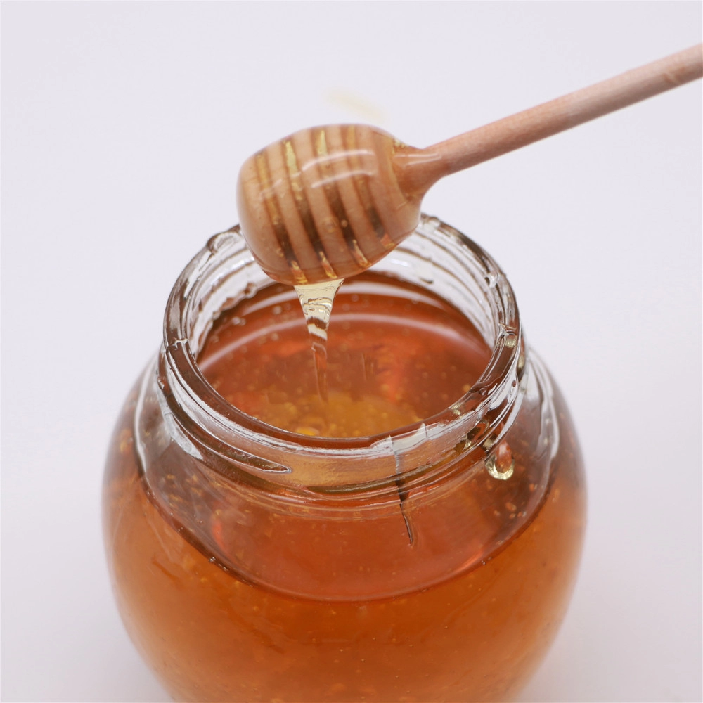 Mật ong hoa súp lơ tự nhiên nguyên chất màu hổ phách nguyên chất trong chai